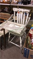Antique child’s height chair with the white