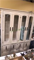 Two piece china cabinet with four doors over four