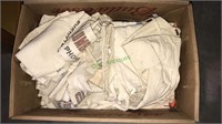 Box full of nail aprons from different lumber