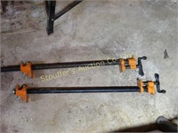 2 Metal pipe clamps - 24"