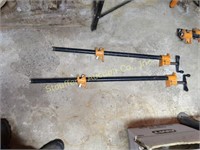 2 Metal pipe clamps - 27" & 33"