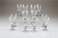 Twelve clear glass wine goblets