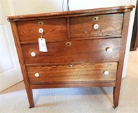 Antique Oak four drawer serpentine front chest
