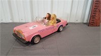 Barbie car and 2 barbies