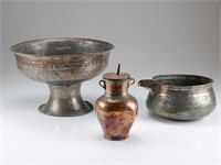 Three Middle Eastern copper decoratives