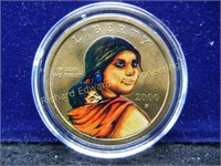 2000 P Sacagawea Dollar. In rare form GOLD leaf.