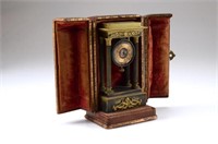 Cased French Empire gilt bronze bracket clock