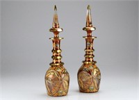 Pair of Bohemian cranberry glass decanters
