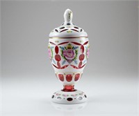 Bohemian cased cranberry glass covered urn