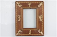 Small antique wood frame with Classical accents