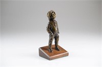 Decorative bronze sculpture of a young fisherman