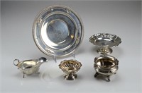 Basket of assorted silver