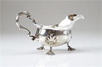 George III English silver crested sauce boat