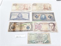 Seven (7) Foreign Currencies