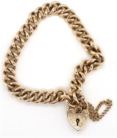 9ct gold curb link bracelet and heart lock