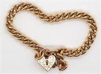 9ct gold heart padlock and curb link bracelet