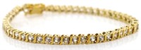 Silver gilt and white gem stone tennis bracelet