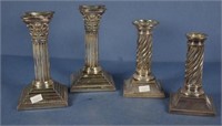 Two various pairs silver plate candlesticks