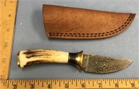 Damascus bladed knife 7" long with antler handle a