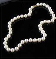 19" Long Strand of Cultured Pearls, 14K