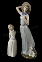 (2) Nadal Porcelain Figurines