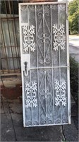 Vintage Ornate Iron Door with screen.