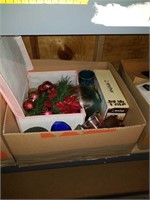 Box of bowls and Christmas decorations