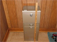 Lockable cabinet with keys