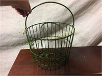 Green painted wire egg gathering basket