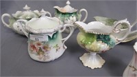 7 RS Prussia pieces including syrup, creamers,