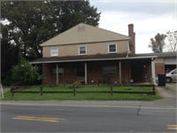 .66+/- Acre Commercial Property w/ House