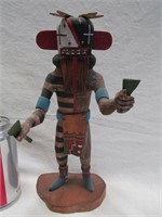 Kachina doll, face red/blue/white, green items