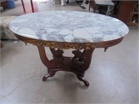 Oval marble top table
