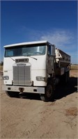 1989 Freightliner with 20' Self Unloading Bed