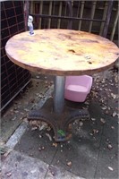 Iron base wood top table