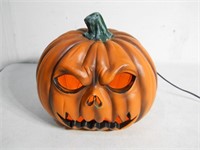 Illuminated scary pumpkin