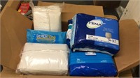 Lot of disposable adult briefs & cleaning cloths