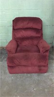 Red cushioned reclining chair