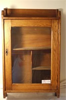 Oak hanging curio cabinet
