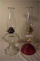 2 unmatched pattern glass oil lamps