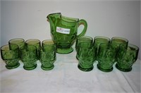 13 Piece green Fostoria pitcher and glasses