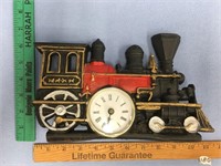 Wrought iron train with battery operated clock in