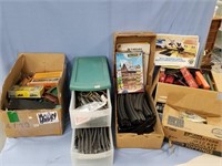 7 box lot with misc. toy railroad train pieces, in