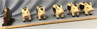 Lot of 6 carved wooden pigs and a carved horn anim