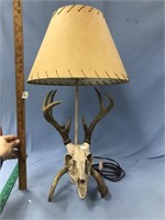 Unique deer skull lamp with horns with a paper sha