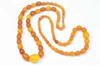 TWO NATURAL AMBER BEADED NECKLACES