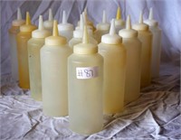 17 white topped plastic squeeze bottles
