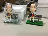 Pair of bobble head Ben Franklin figurines
