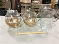 3 glass pitchers