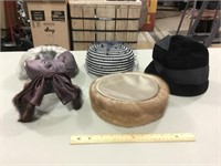 5 women’s hats and 2 hat boxes